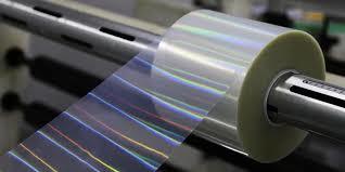 O adesivo laminado do filme a laser é compatível com os materiais que será laminado?
